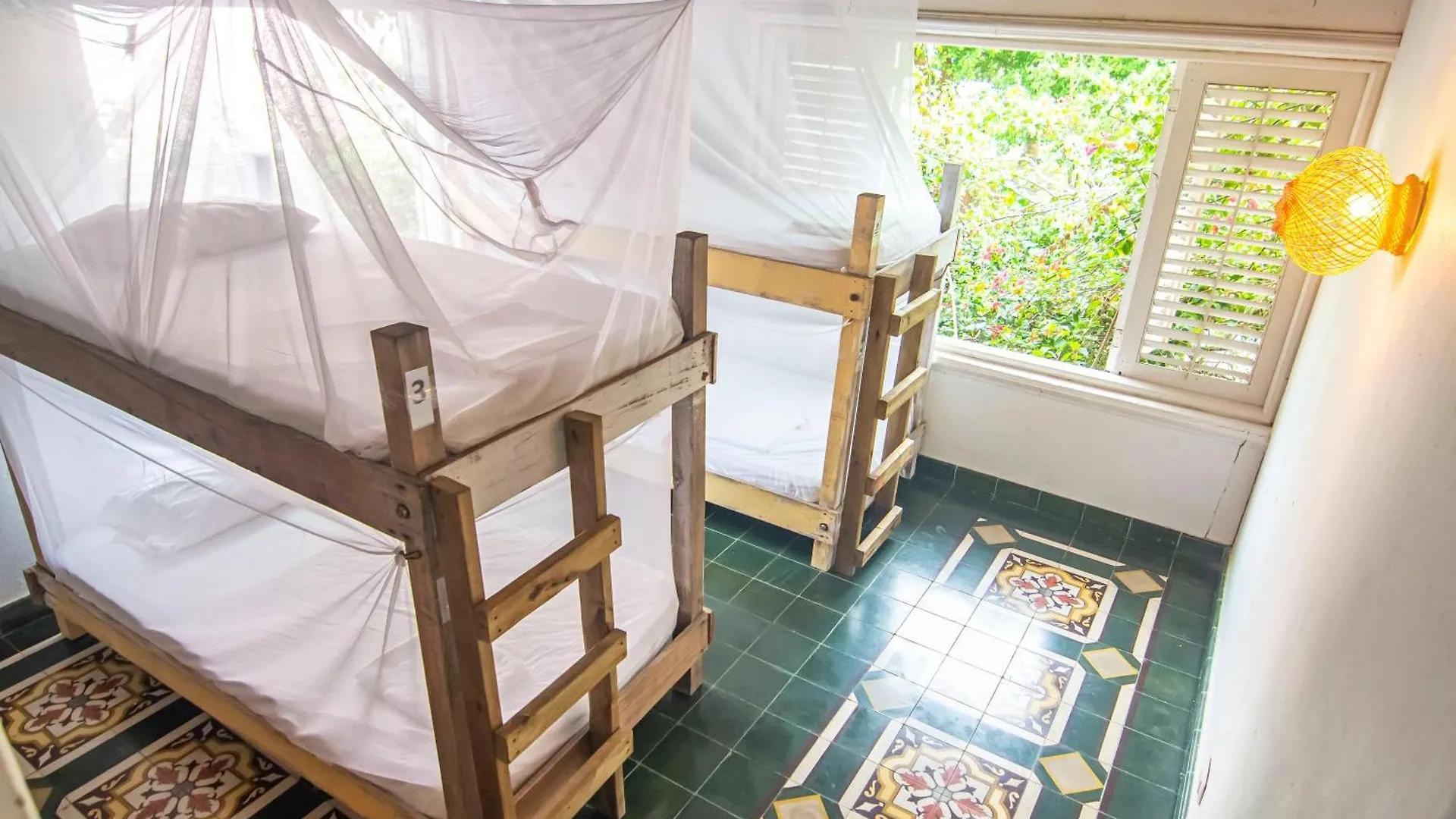 Hostal Secreto Isla Grande  Auberge de jeunesse